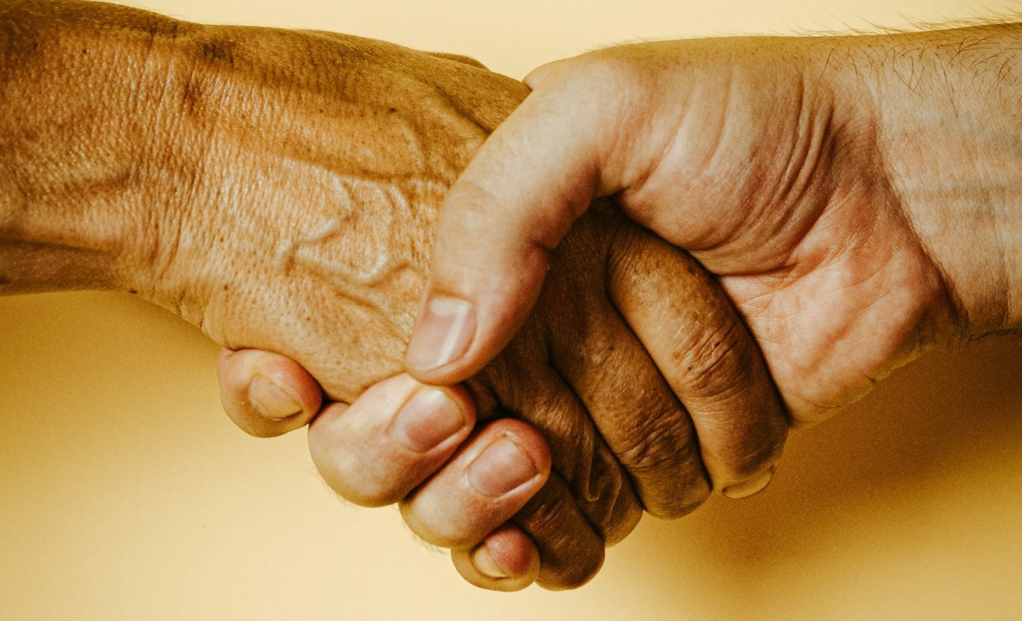 person holding babys hand